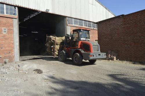 Loading and packing bales